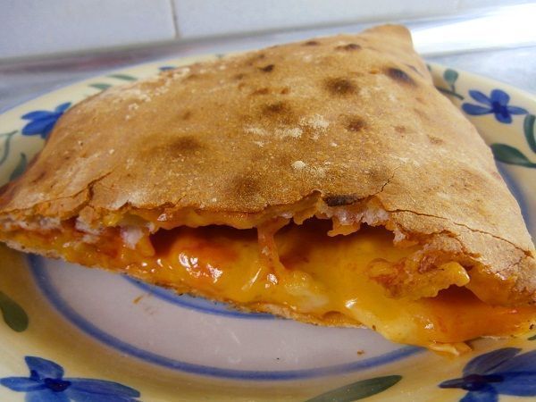 Delicioso Calzone o Pizza Enrollada: La elección perfecta para tu paladar